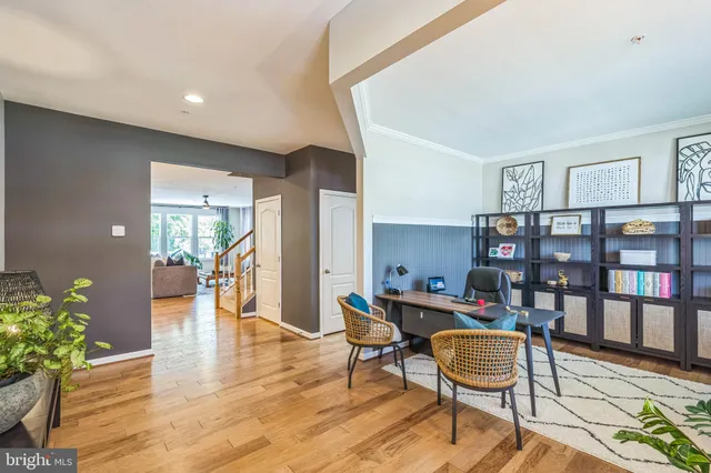 a workspace with furniture and book shelf