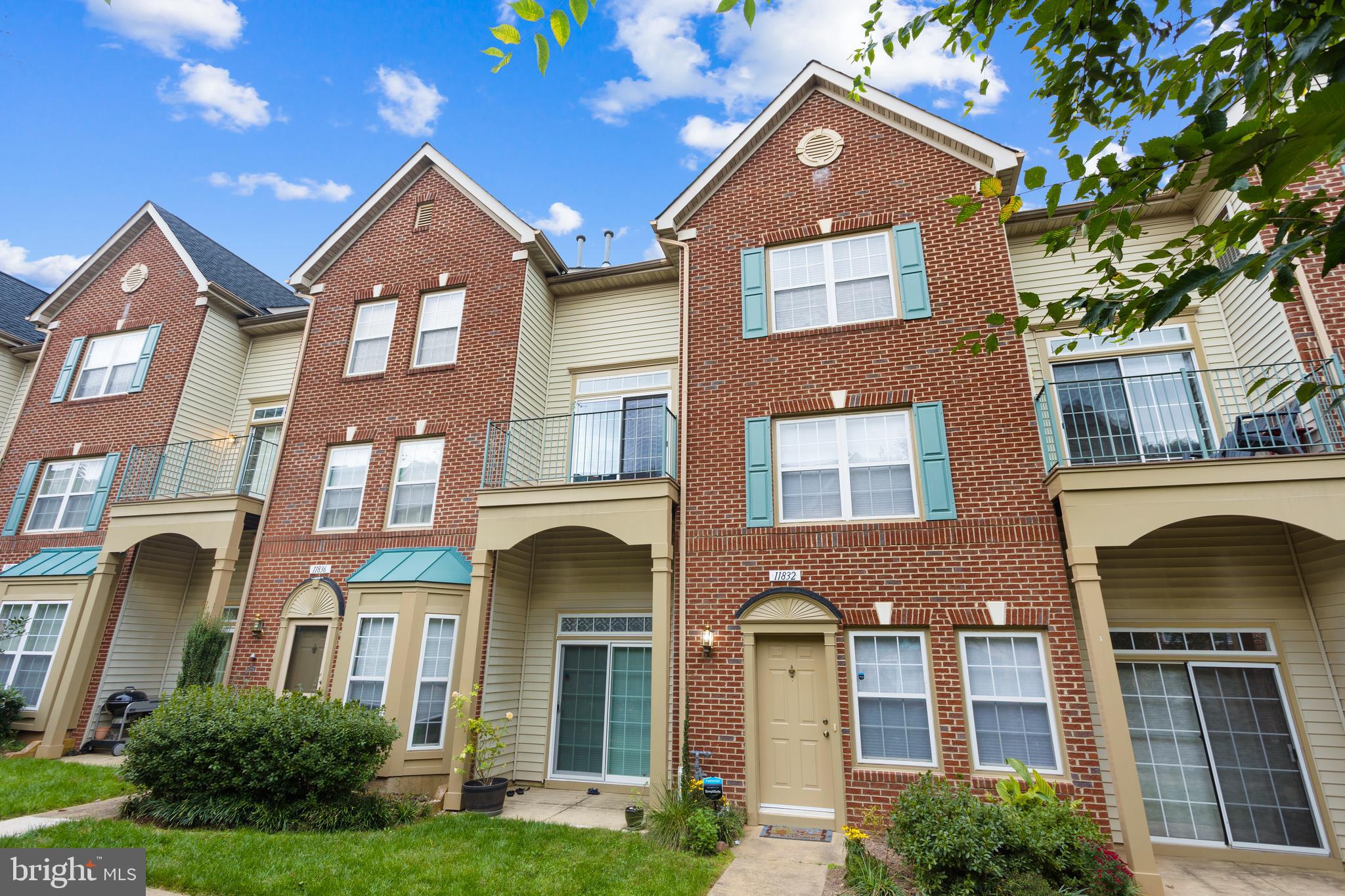 11834 Breton Court, Unit 22B Reston, VA 20191 - Photo 13 of 43 Courtyard View facing deck off the lwr lvl (den)