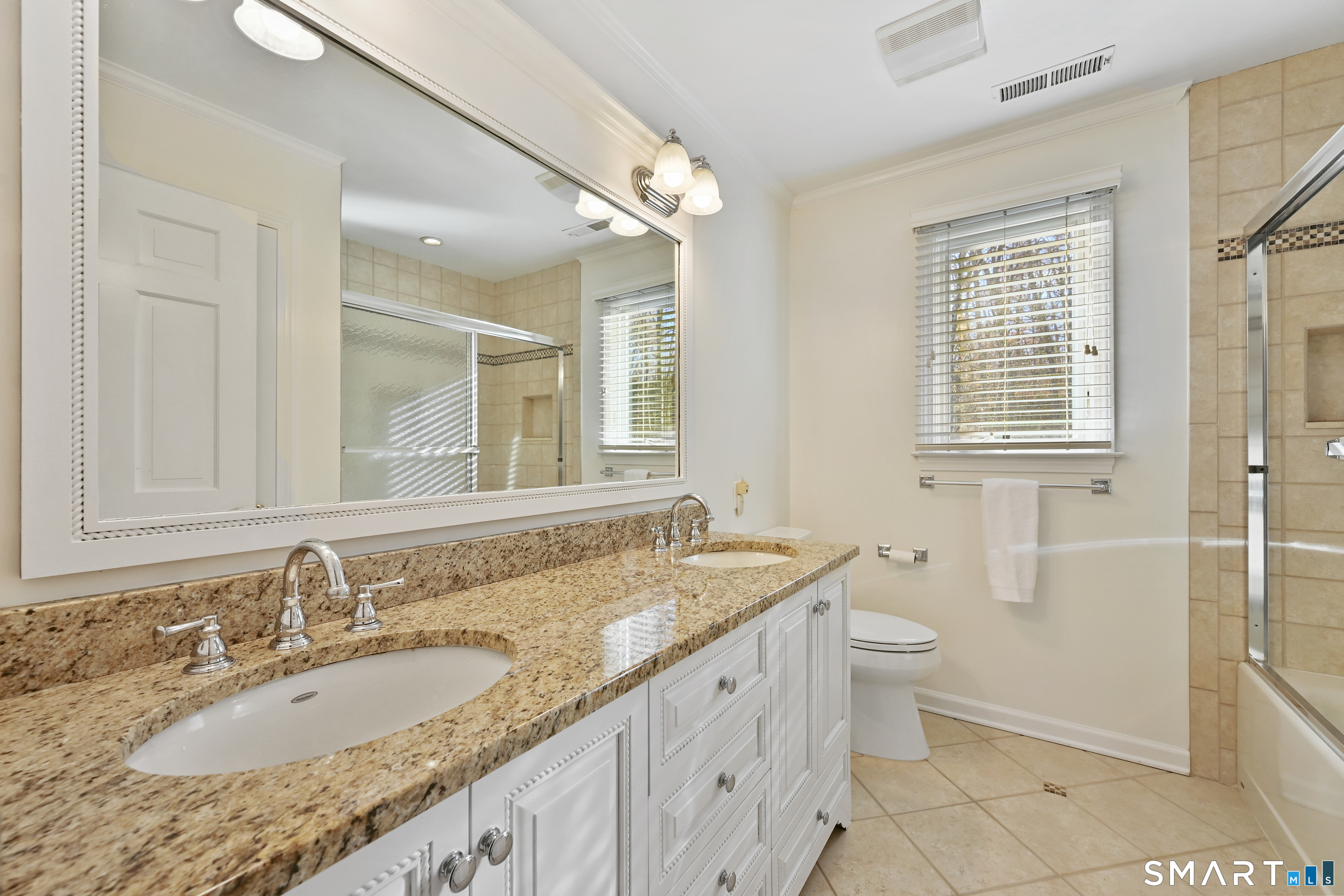 84 Delaware Road Easton, CT 06612 - Photo 23 of 39 a bathroom with a granite countertop sink and a mirror
