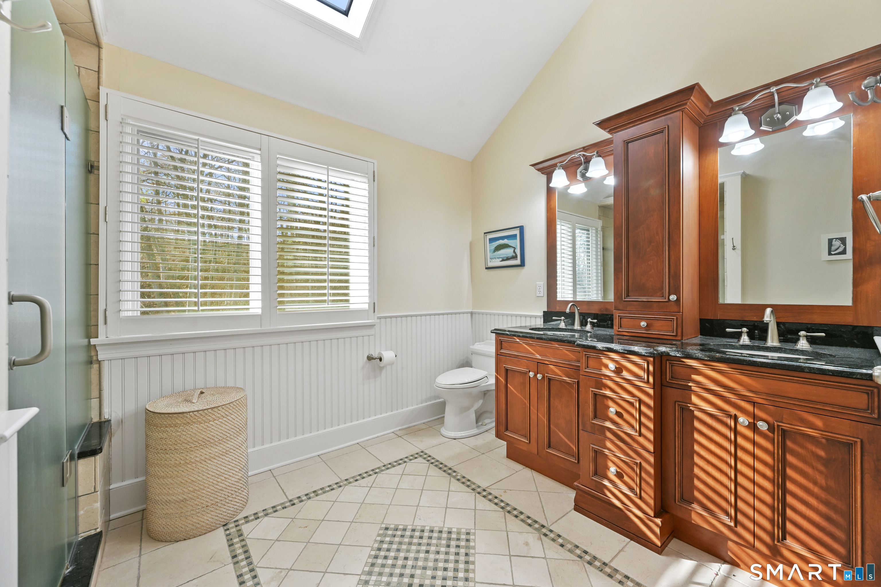 84 Delaware Road Easton, CT 06612 - Photo 27 of 39 a bathroom with a bathtub a sink a mirror and a shower