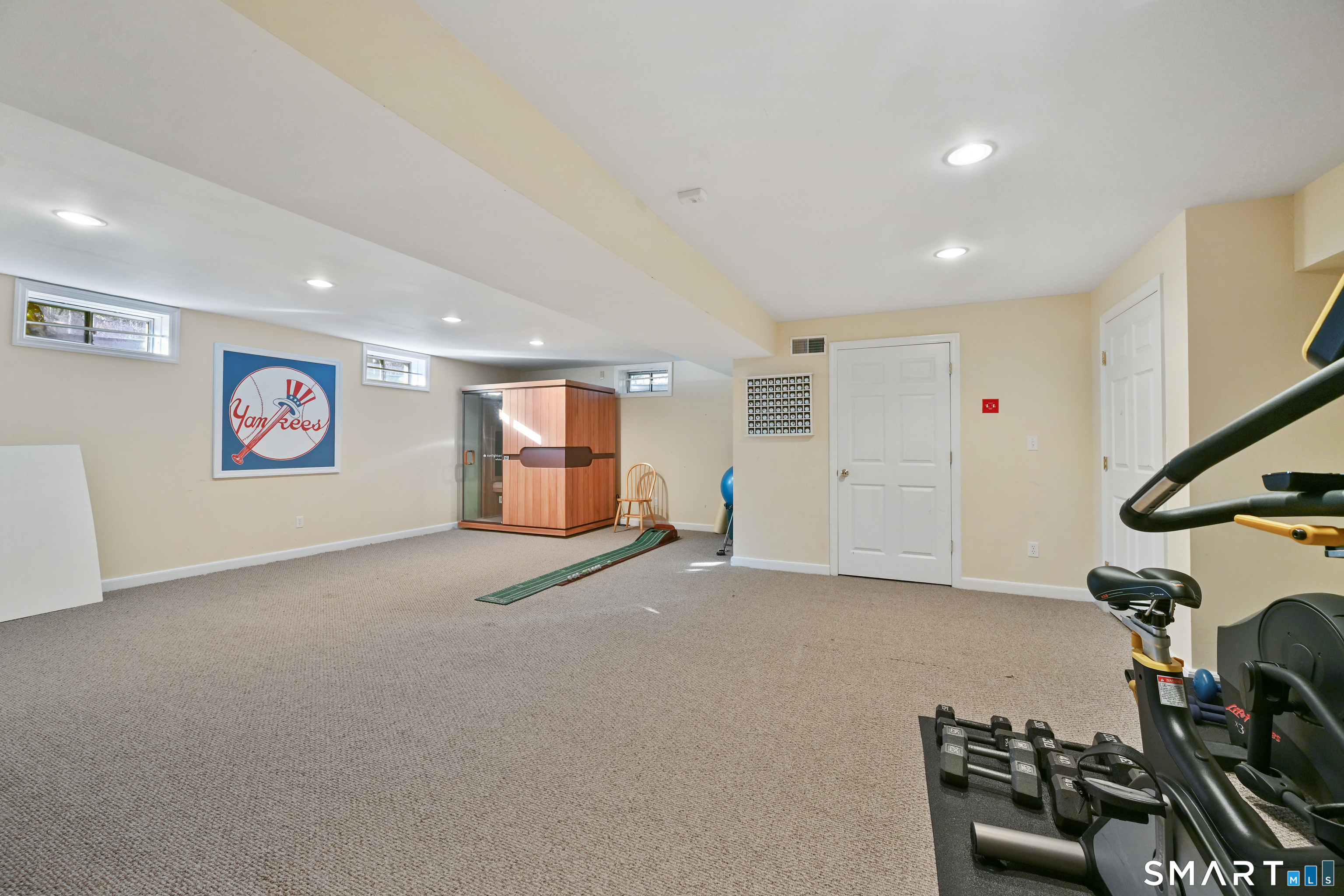 84 Delaware Road Easton, CT 06612 - Photo 29 of 39 a view of a room with gym equipment