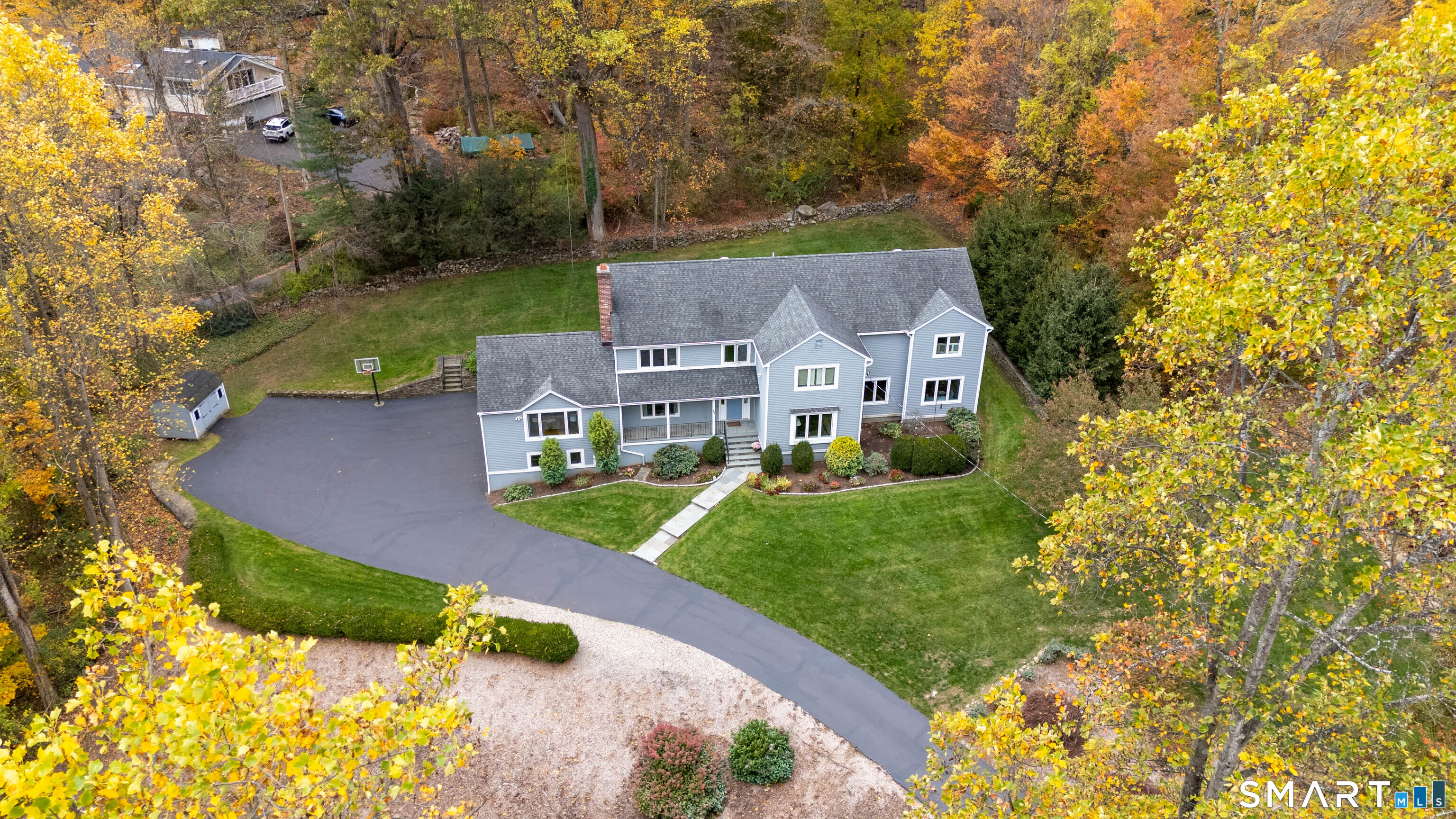 84 Delaware Road Easton, CT 06612 - Photo 37 of 39 a front view of a house with garden