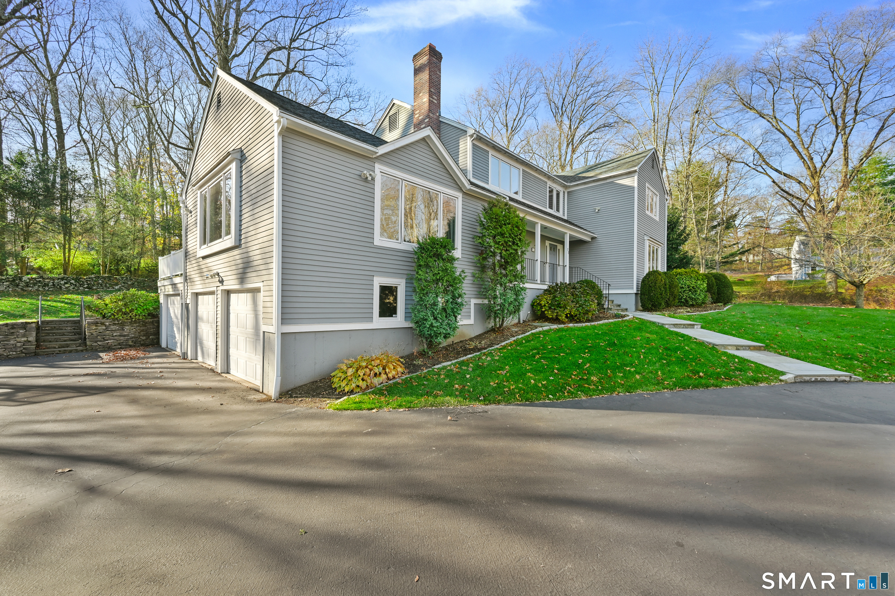 84 Delaware Road Easton, CT 06612 - Photo 39 of 39 a front view of a house with garden