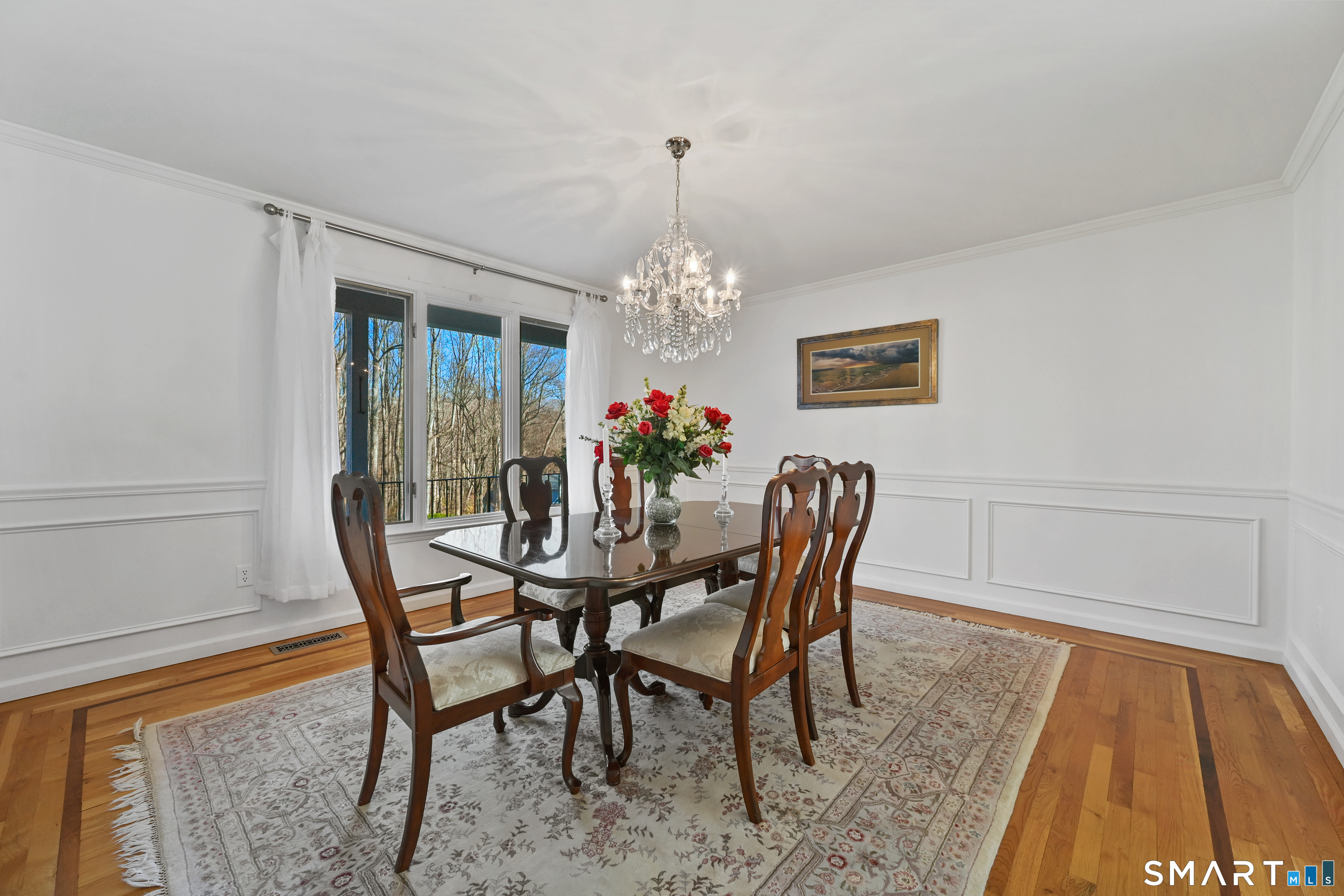 84 Delaware Road Easton, CT 06612 - Photo 4 of 39 a dining room with furniture and chandelier
