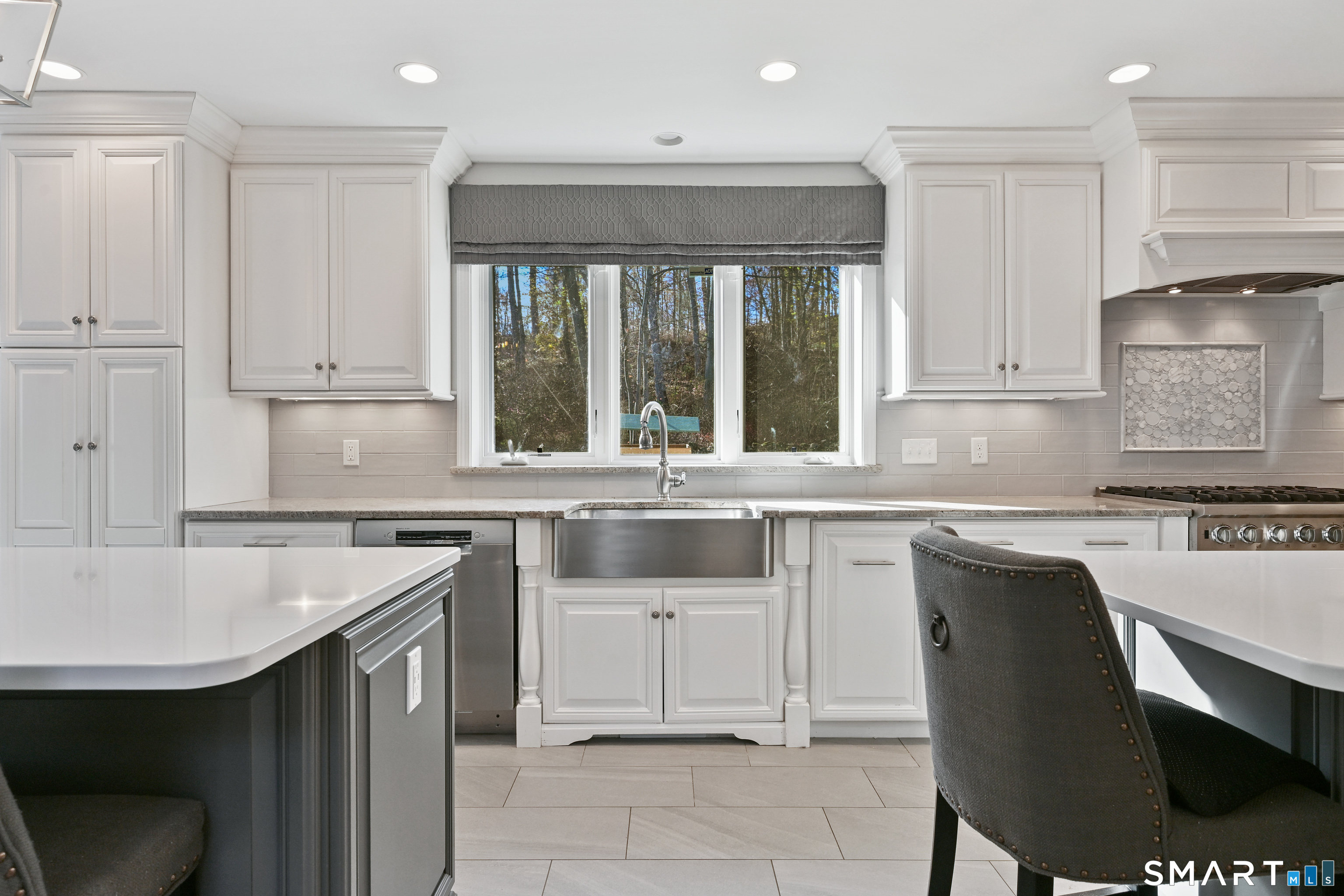 84 Delaware Road Easton, CT 06612 - Photo 7 of 39 a kitchen with a sink and cabinets
