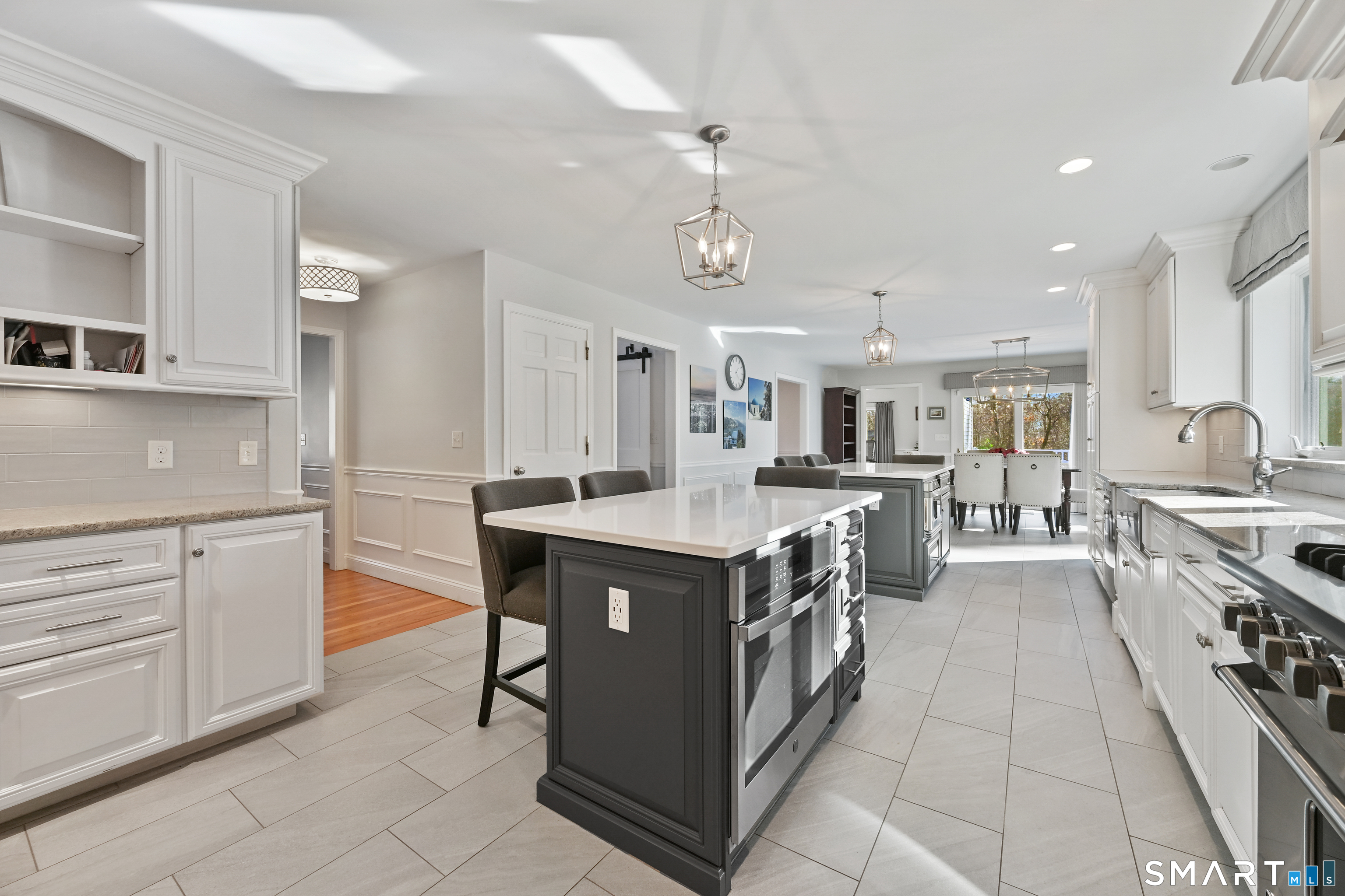 84 Delaware Road Easton, CT 06612 - Photo 9 of 39 a kitchen with stainless steel appliances granite countertop a stove and a sink