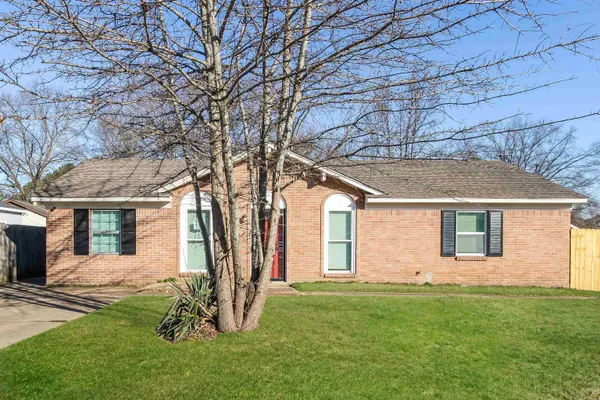 front view of house with a yard