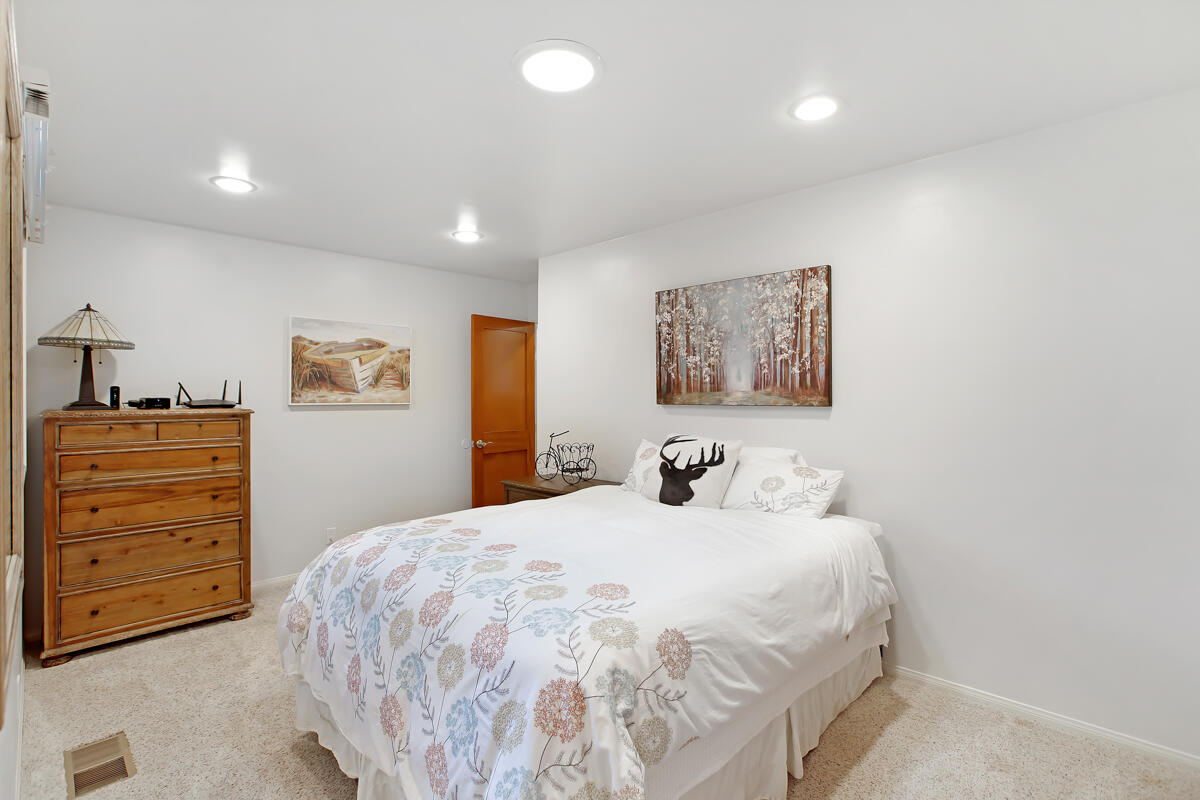4009 Primavera Road Santa Barbara, CA 93110 - Photo 22 of 41 a bedroom with a bed and a dresser