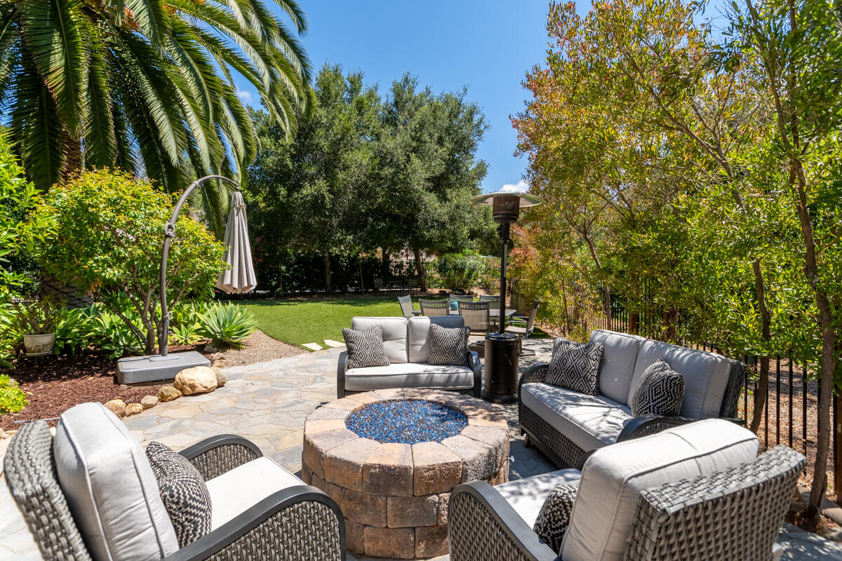 4009 Primavera Road Santa Barbara, CA 93110 - Photo 34 of 41 a patio with patio a couch and chairs