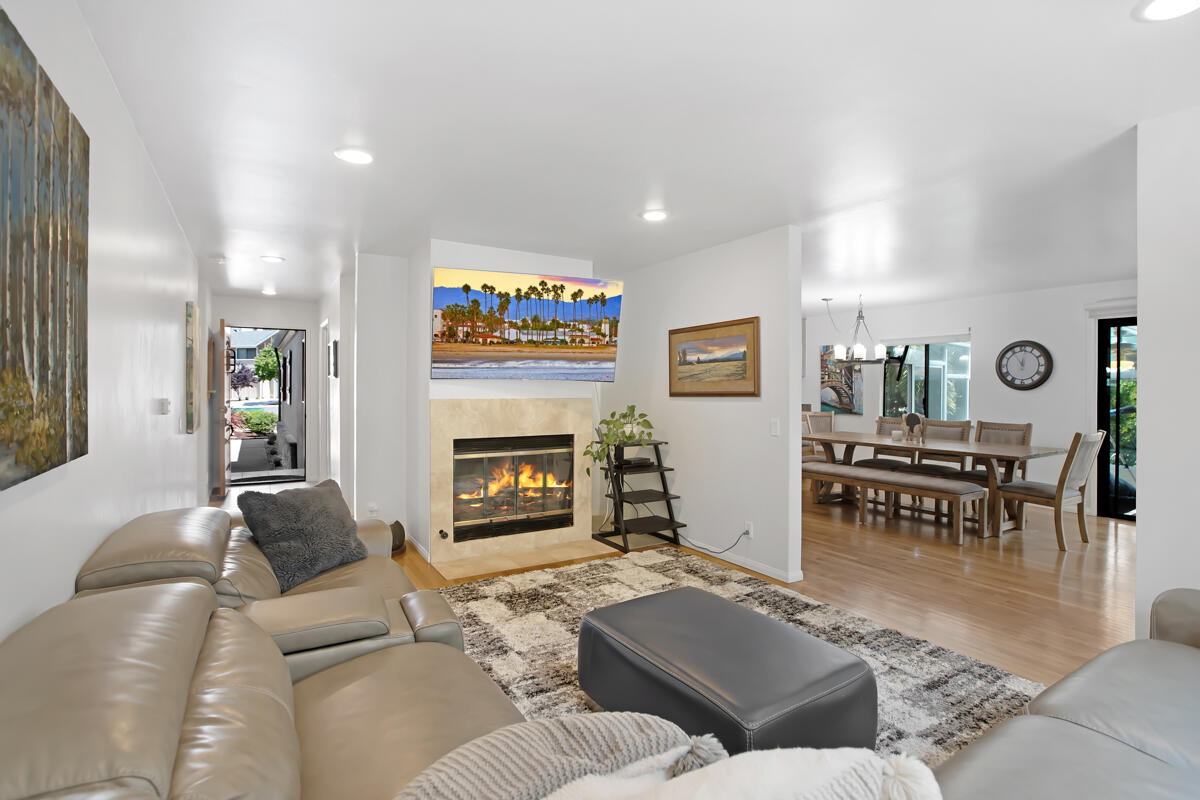 4009 Primavera Road Santa Barbara, CA 93110 - Photo 8 of 41 a living room with furniture and a fireplace