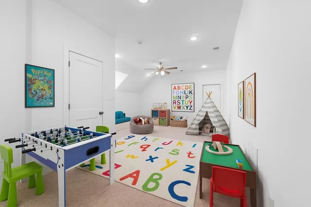 a bedroom with bed and a window