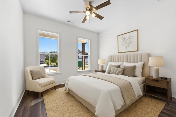 a view of an empty room with a fan
