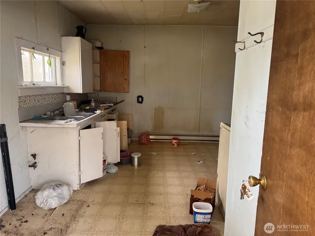 a bathroom with a sink toilet and vanity