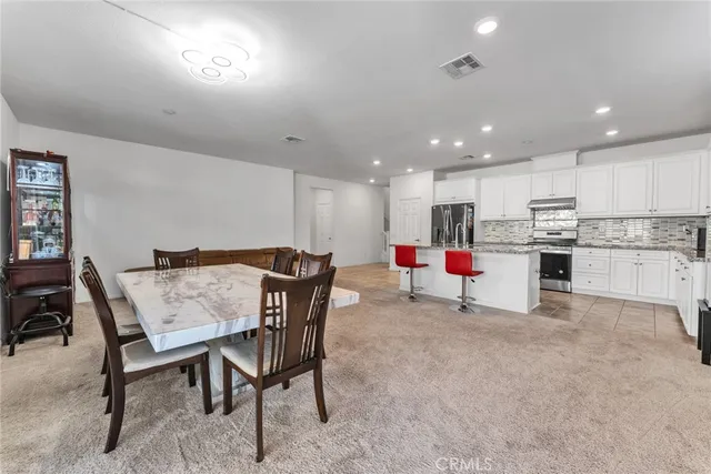 a view of a livingroom with furniture and window
