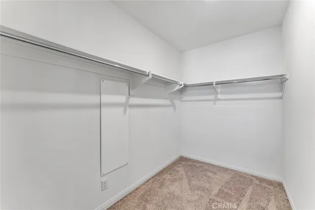 a large bathroom with a tub a sink shower and mirror