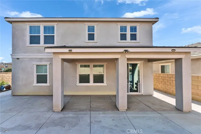 a view of a building with sitting area
