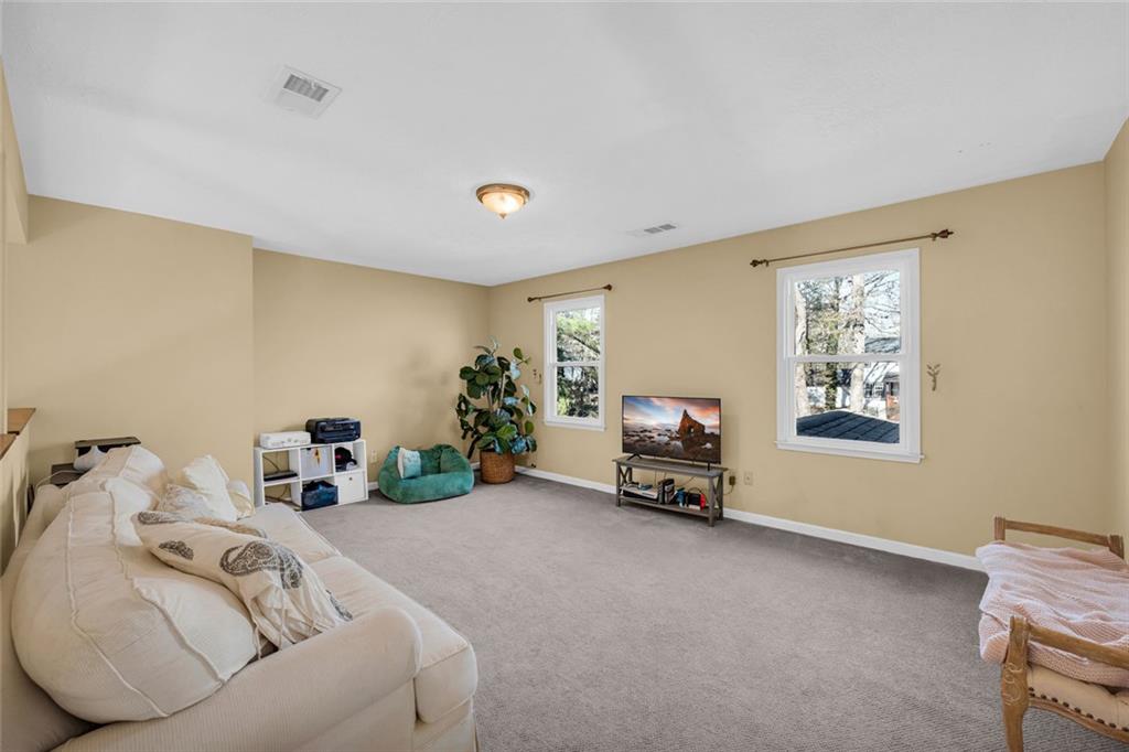 3765 Linwood Way Snellville, GA 30039 - Photo 18 of 53 a kids room with furniture and a window