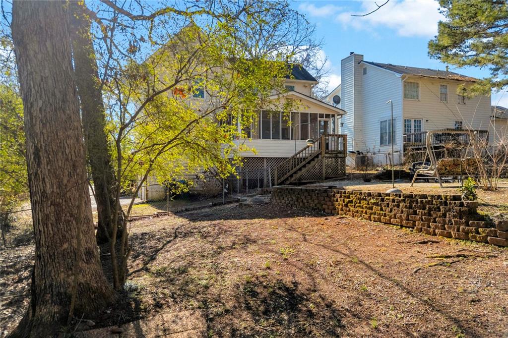 3765 Linwood Way Snellville, GA 30039 - Photo 45 of 53 a front view of a house with a yard