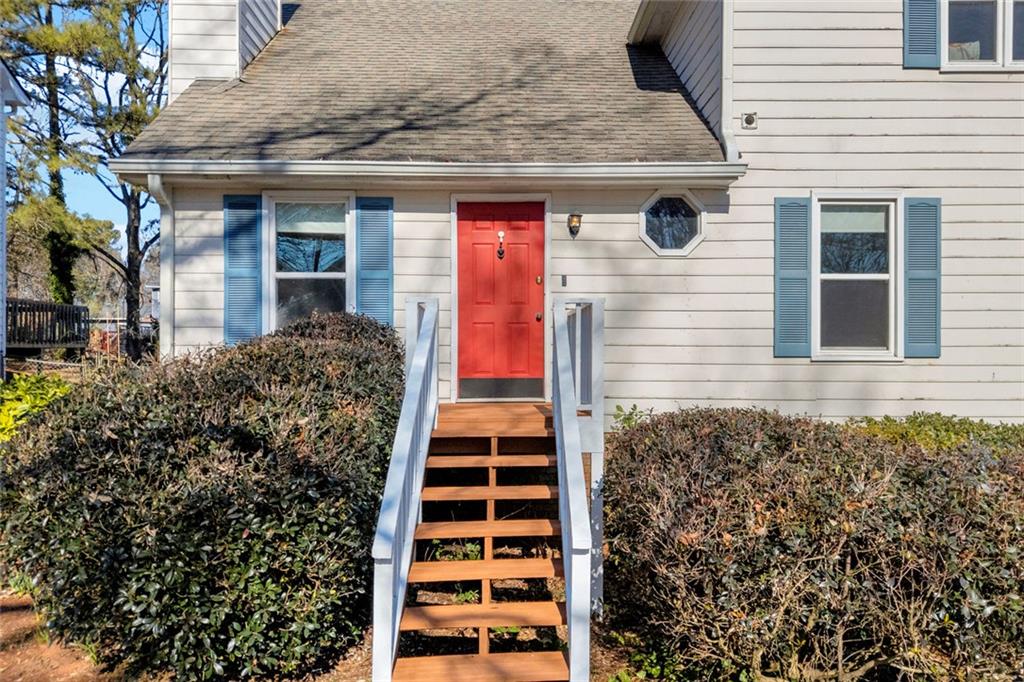 3765 Linwood Way Snellville, GA 30039 - Photo 7 of 53 front view of a house with a door