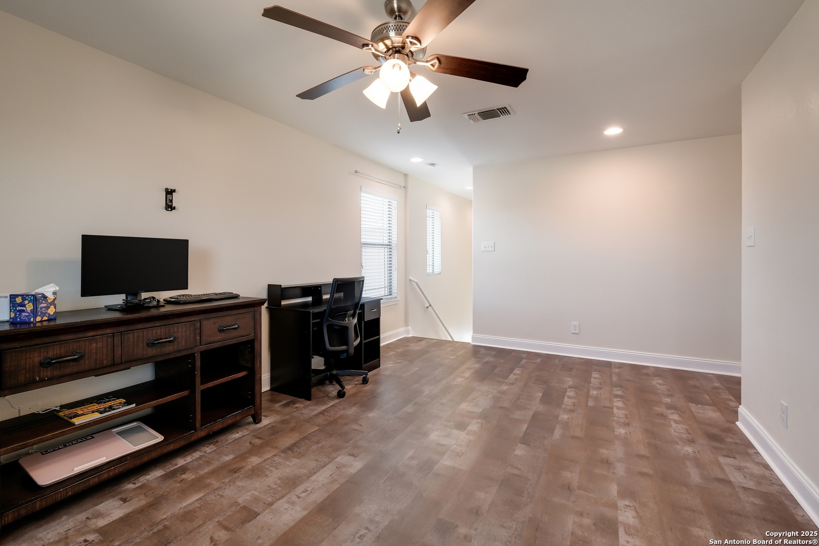 7207 Kitty Court Converse, TX 78109 - Photo 12 of 19 a room with furniture and flat screen tv