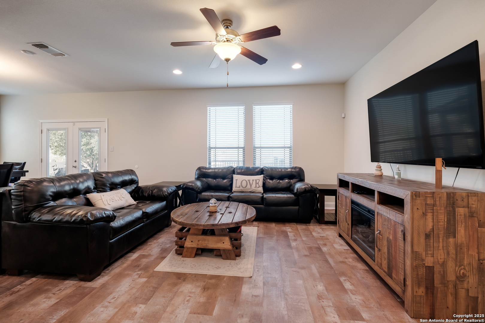 7207 Kitty Court Converse, TX 78109 - Photo 3 of 19 a living room with furniture and a flat screen tv