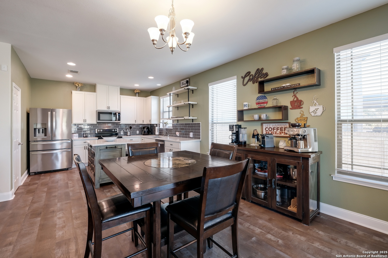 7207 Kitty Court Converse, TX 78109 - Photo 5 of 19 a view of a dining room with furniture window and wooden floor