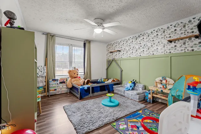 a living room with furniture and a table