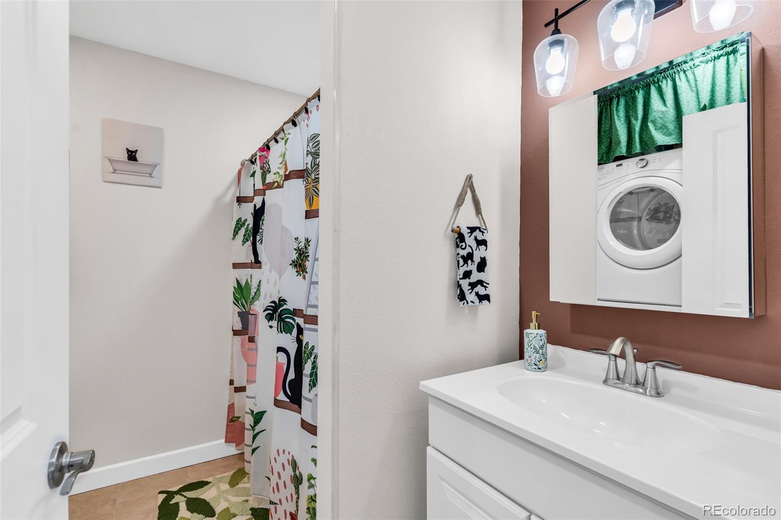 10380 Coyote Lane Rye, CO 81069 - Photo 44 of 50 a bathroom with a sink vanity and mirror