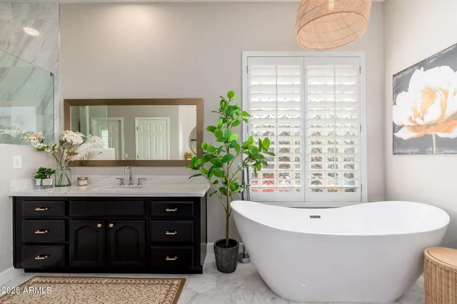 a bedroom with a bed and cabinets
