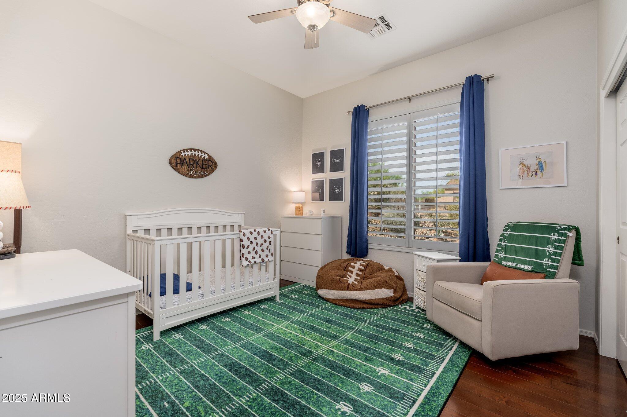 5712 East Blue Sky Drive Scottsdale, AZ 85266 - Photo 30 of 79 a bedroom with furniture and a window