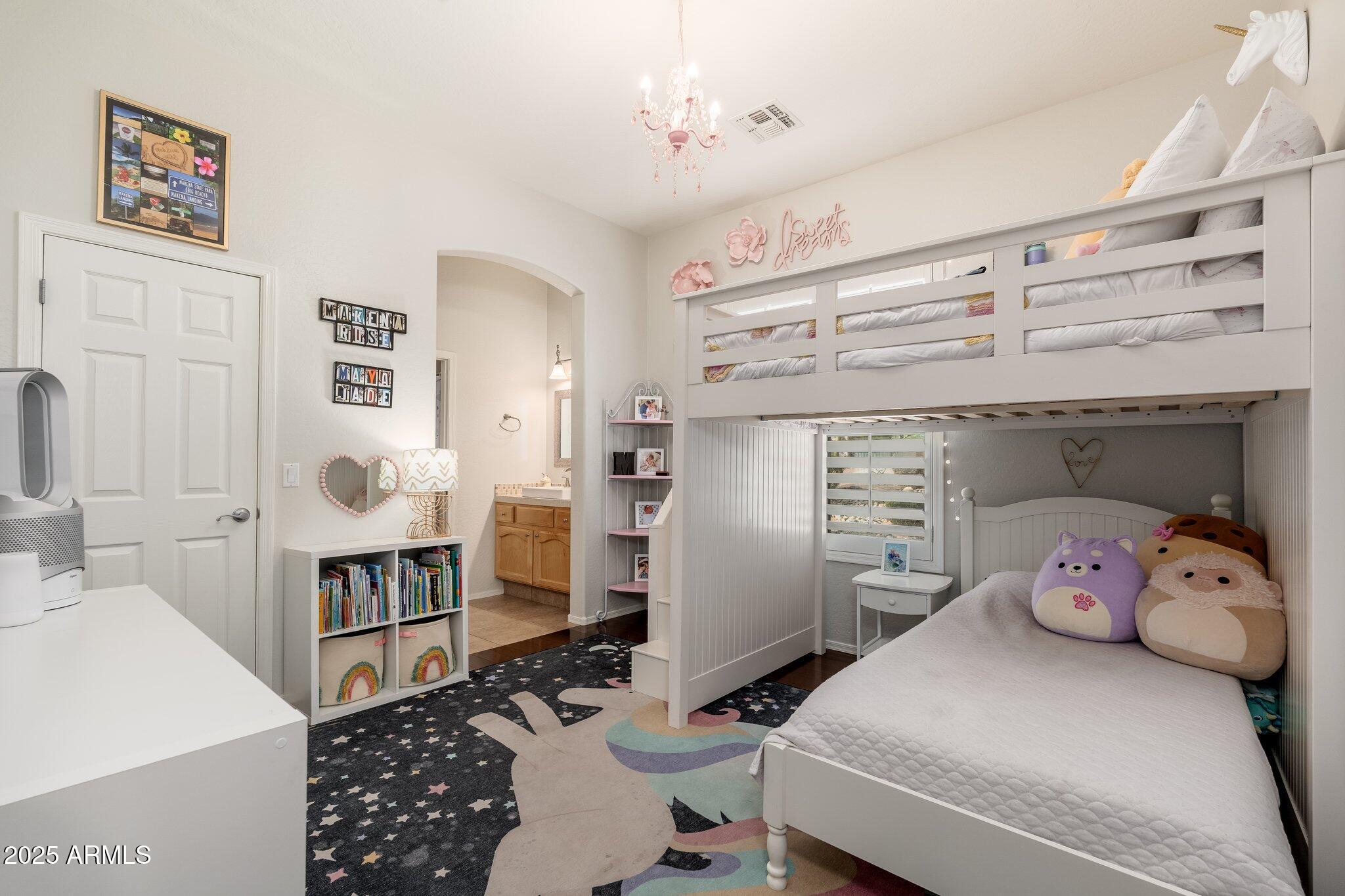 5712 East Blue Sky Drive Scottsdale, AZ 85266 - Photo 32 of 79 a bedroom with a bed and cabinets