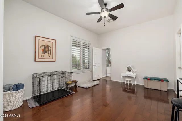 a kitchen with kitchen island a sink stove and microwave