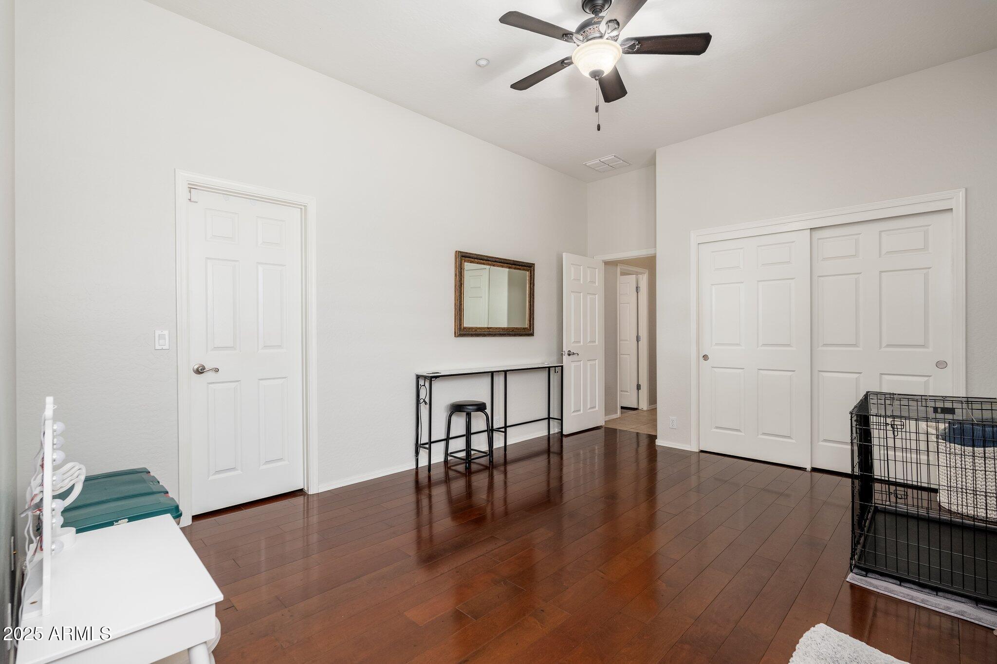 5712 East Blue Sky Drive Scottsdale, AZ 85266 - Photo 36 of 79 a view of a livingroom with a hardwood floor and hallway