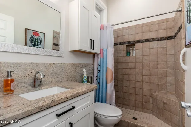 a view of a lake with a building in the background