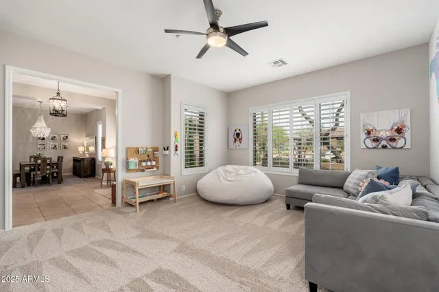 a living room with furniture and window
