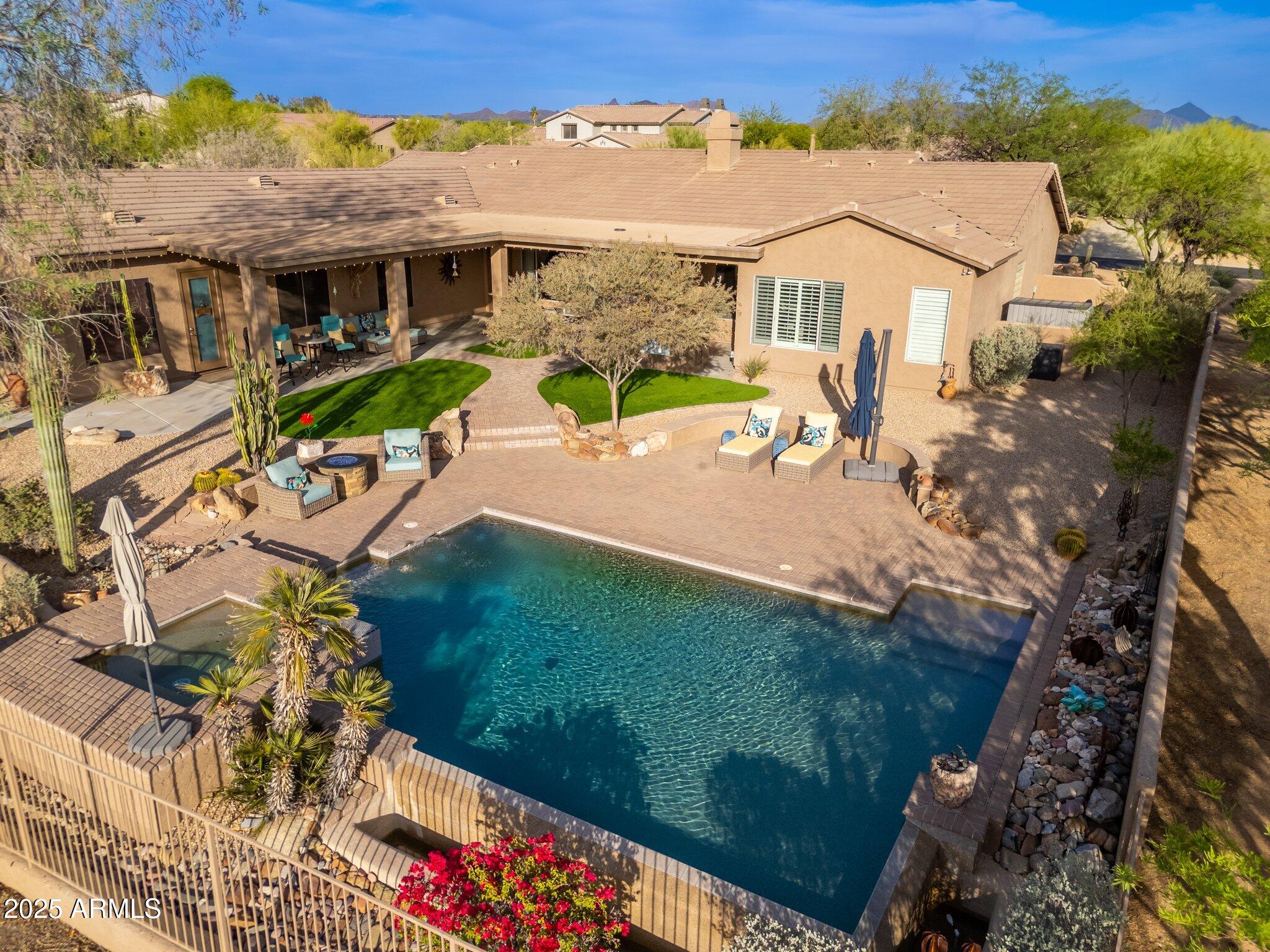 5712 East Blue Sky Drive Scottsdale, AZ 85266 - Photo 75 of 79 an aerial view of a house with a yard