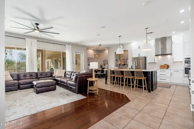 a living room with furniture a fireplace