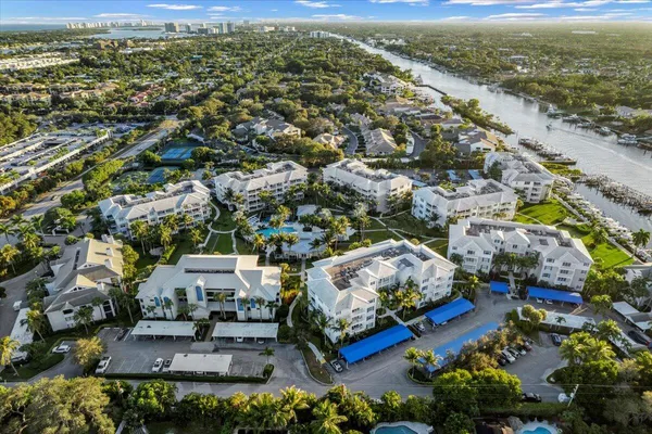 an aerial view of a house with a lake view