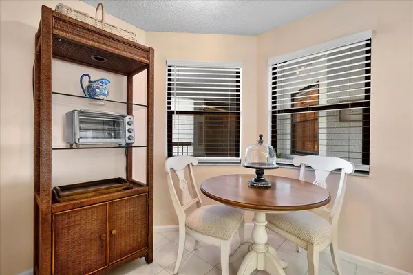 a kitchen with a sink and a refrigerator