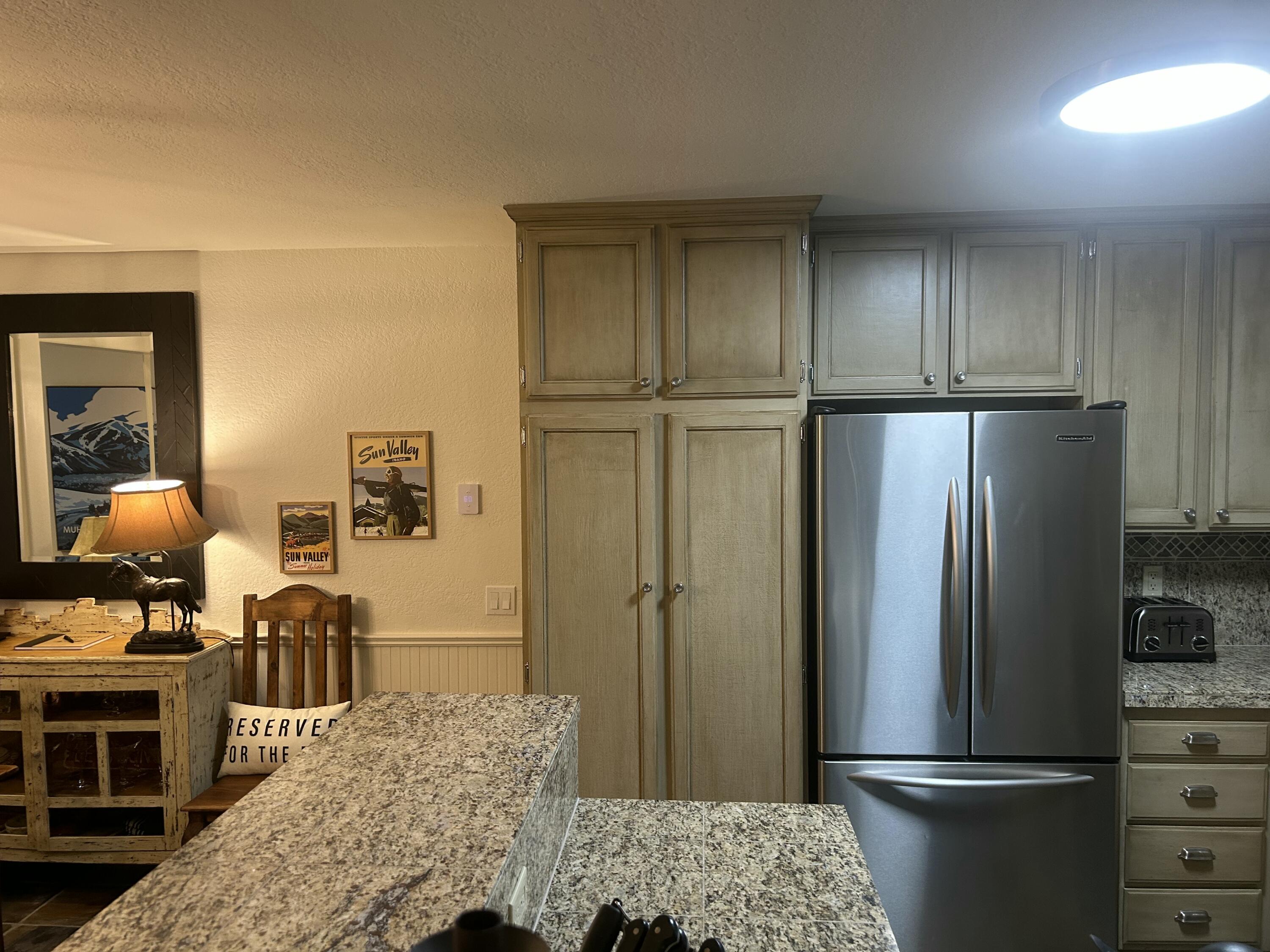 2639 Ridge Lane, Unit 39 Sun Valley, ID 83353 - Photo 9 of 35 Pantry & Stainless Fridge