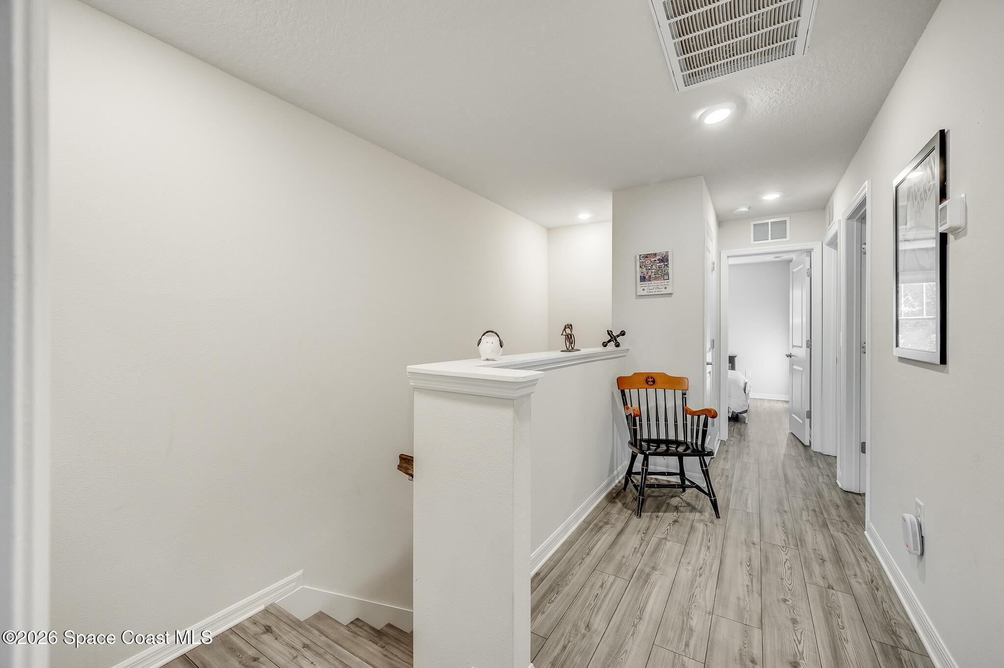 2202 Gopher Tortoise Terrace Oakland, FL 34787 - Photo 18 of 42 a view of dining room with furniture and wooden floor