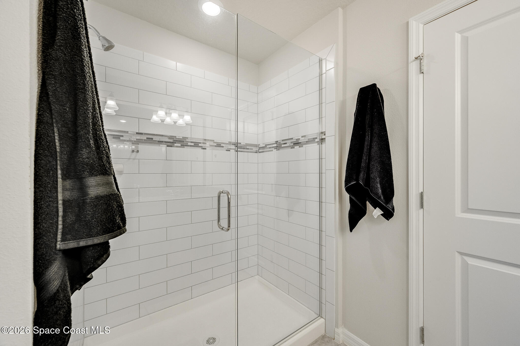 2202 Gopher Tortoise Terrace Oakland, FL 34787 - Photo 26 of 42 a bathroom with a shower