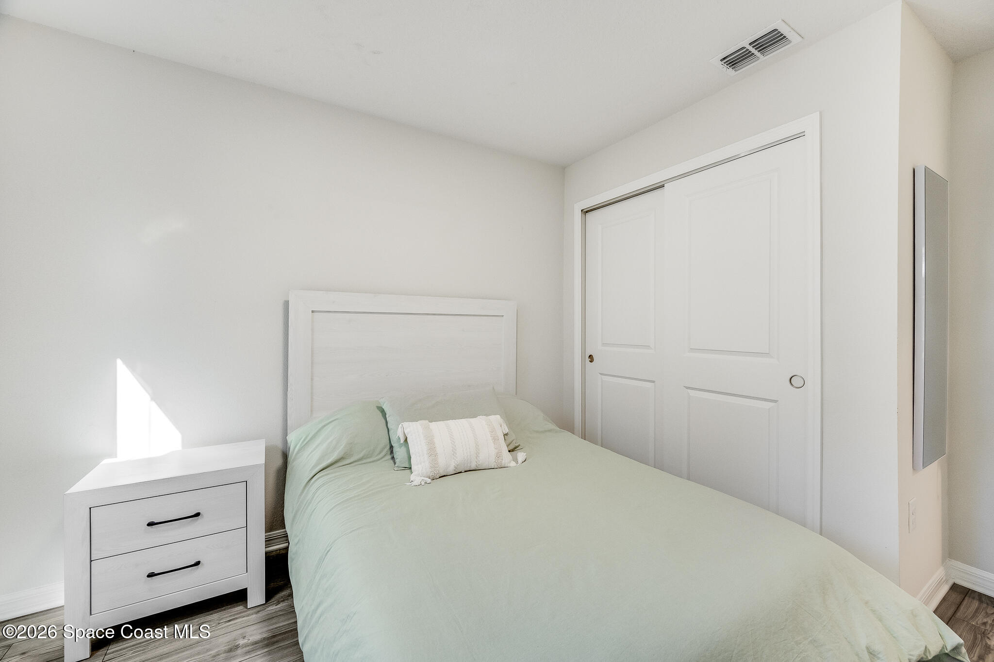 2202 Gopher Tortoise Terrace Oakland, FL 34787 - Photo 34 of 42 a bedroom with a bed and a window