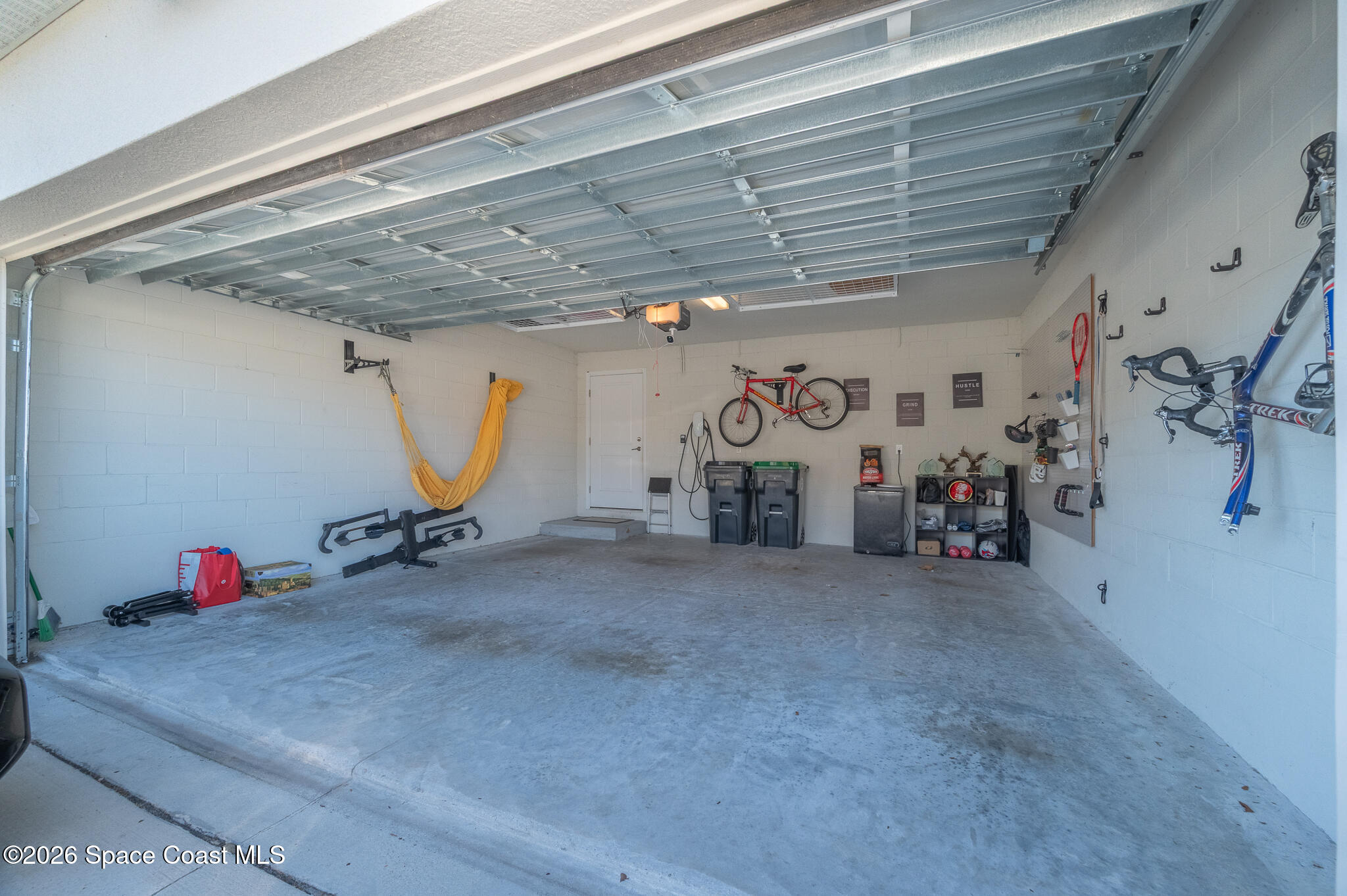2202 Gopher Tortoise Terrace Oakland, FL 34787 - Photo 41 of 42 a view of a garage with storage