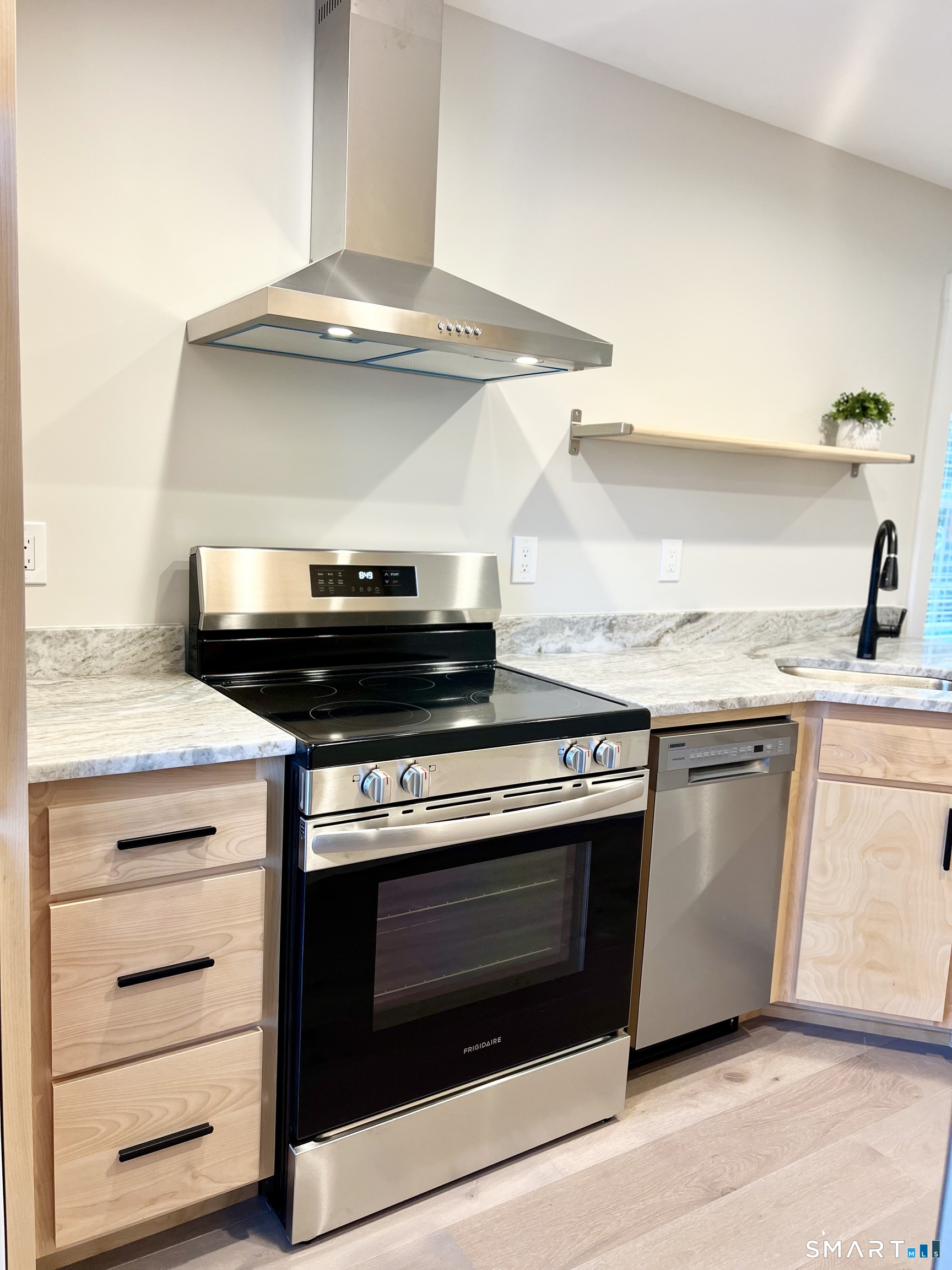 179 Butternut Street, Unit 6 Middletown, CT 06457 - Photo 11 of 34 a stove top oven sitting inside of a kitchen