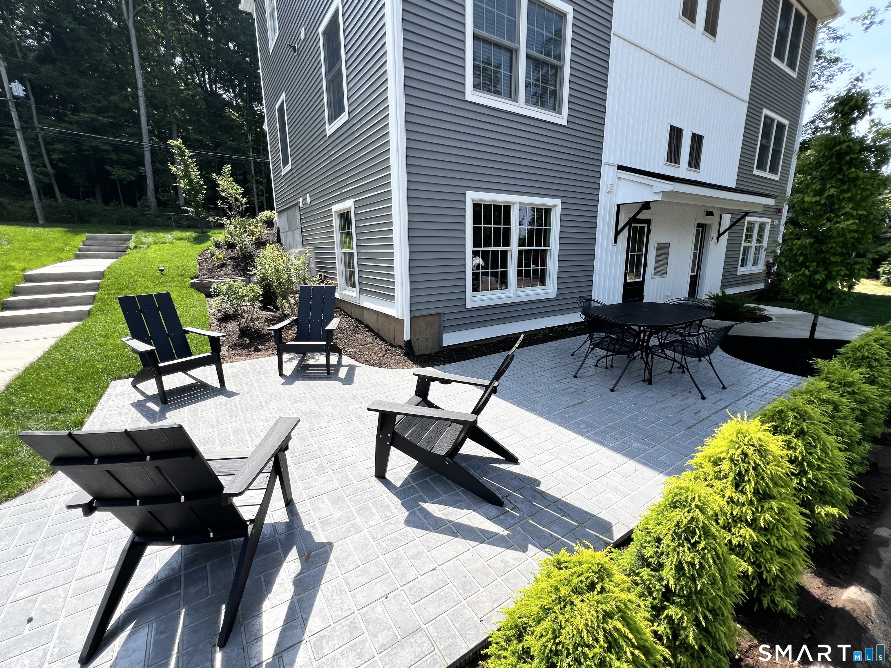 179 Butternut Street, Unit 6 Middletown, CT 06457 - Photo 27 of 34 a view of a backyard with sitting area