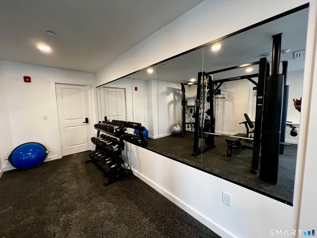 a view of a room with gym equipment