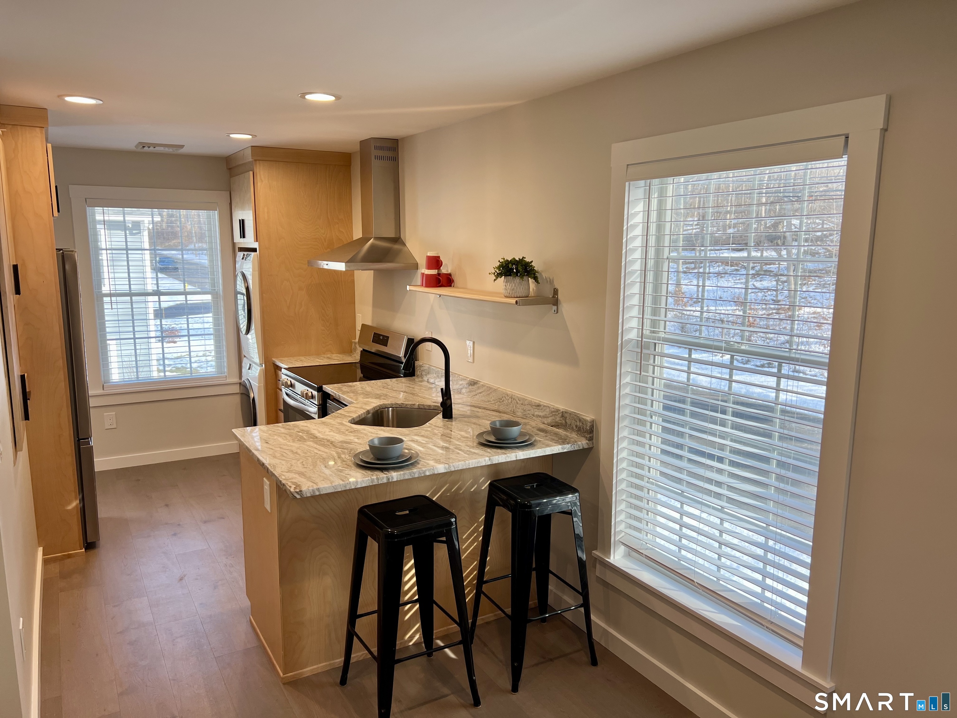 179 Butternut Street, Unit 6 Middletown, CT 06457 - Photo 6 of 34 a view of a dining room with furniture and window