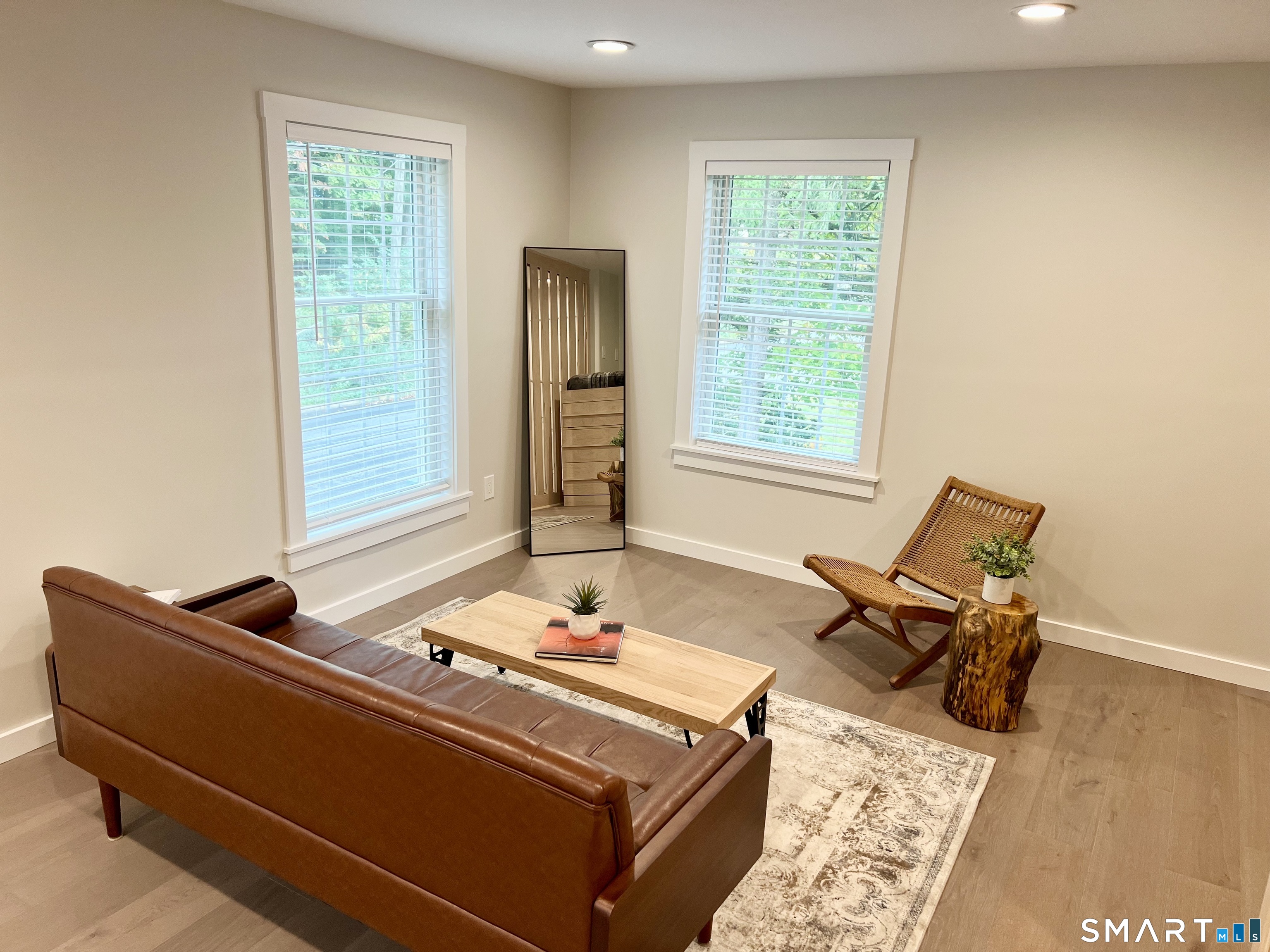 179 Butternut Street, Unit 6 Middletown, CT 06457 - Photo 8 of 34 a living room with furniture and window