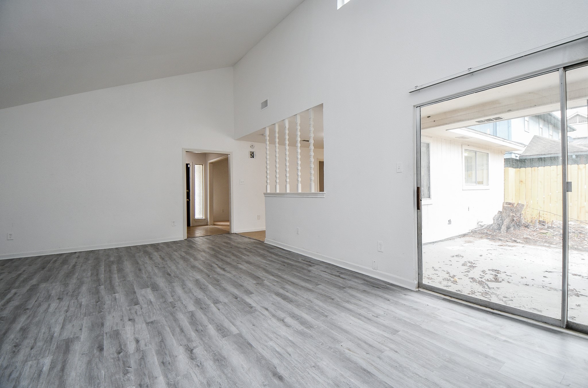 6411 Teal Run Drive Houston, TX 77035 - Photo 19 of 32 wooden floor in an empty room with a window